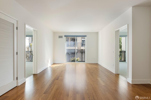 empty room featuring hardwood / wood-style floors