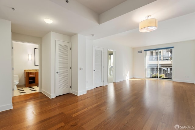 interior space with hardwood / wood-style flooring