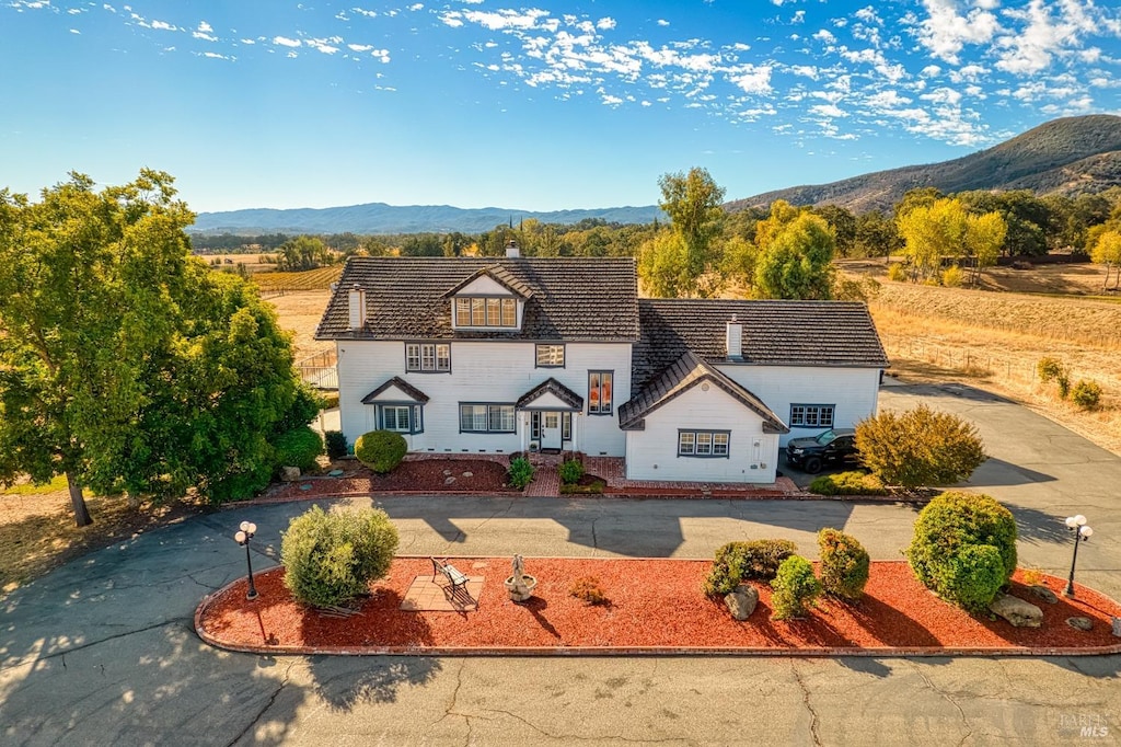 view of front of home with a mountain view