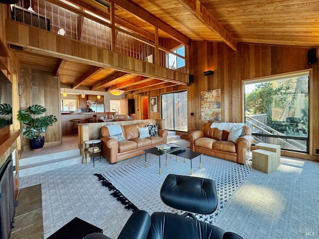 tiled living room with wooden walls, wooden ceiling, and vaulted ceiling with beams