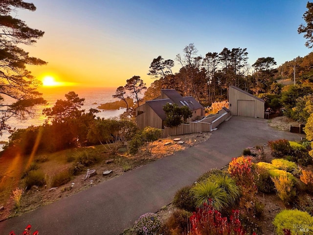 33755 Yardarm Dr Unit 15-1, The Sea Ranch, CA 95497 - yard at dusk with an outbuilding and fence