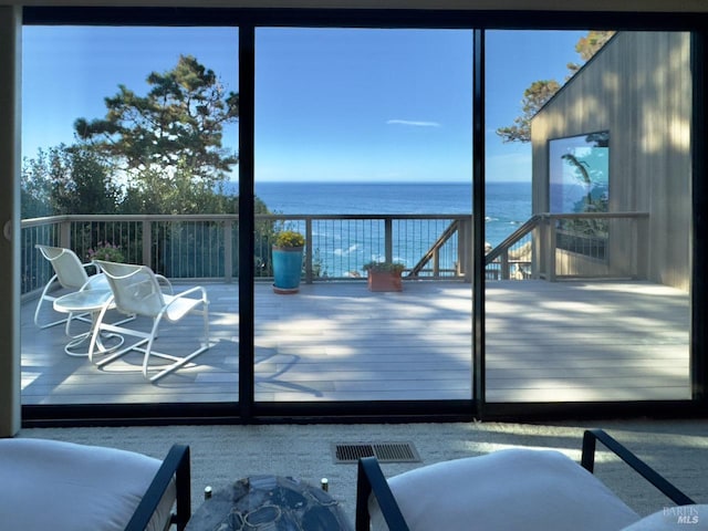 entryway with a water view