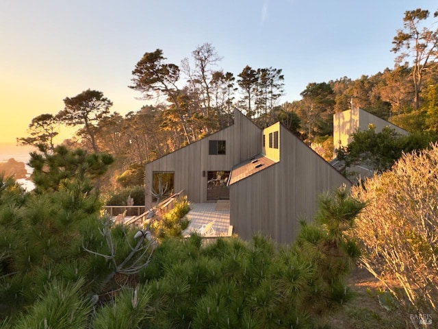 view of outdoor structure at dusk