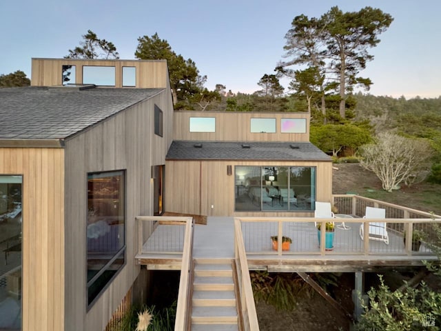 33755 Yardarm Dr Unit 15-1, The Sea Ranch, CA 95497 - back of house with a shingled roof, a wooden deck, and stairway
