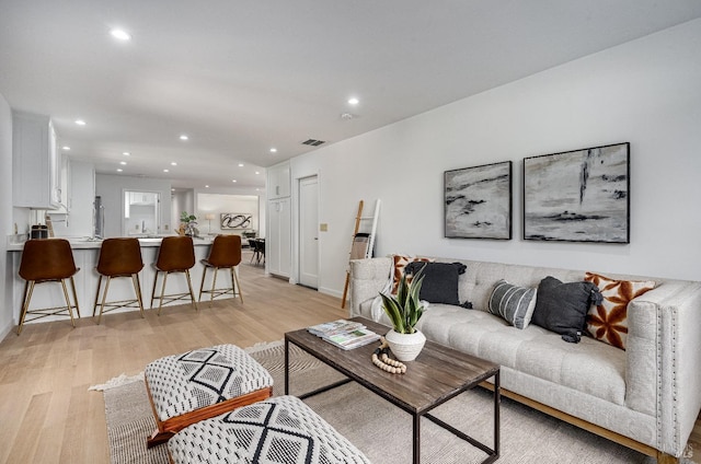 living room featuring light hardwood / wood-style floors