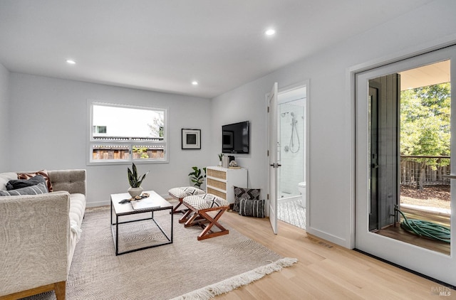 living room featuring light wood-type flooring