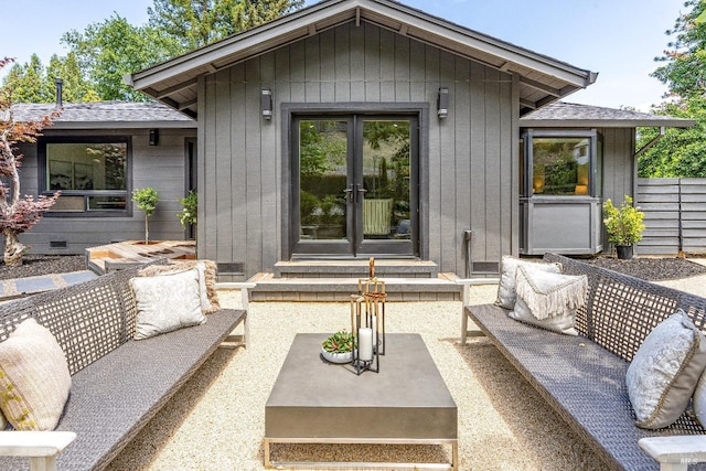 view of patio / terrace with french doors and an outdoor living space