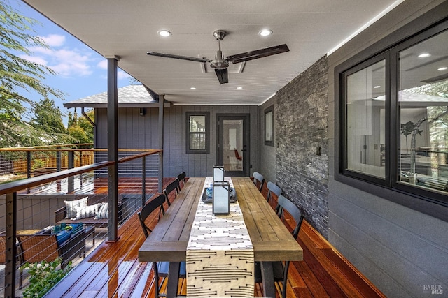 wooden deck with ceiling fan