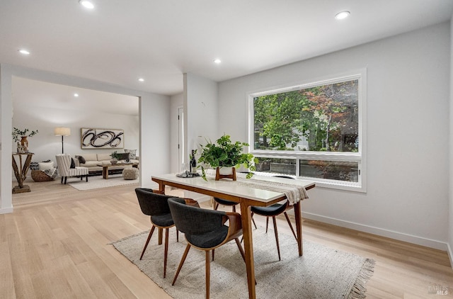 dining room with light hardwood / wood-style floors