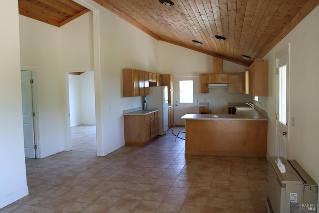 kitchen with wooden ceiling, kitchen peninsula, white refrigerator, and high vaulted ceiling