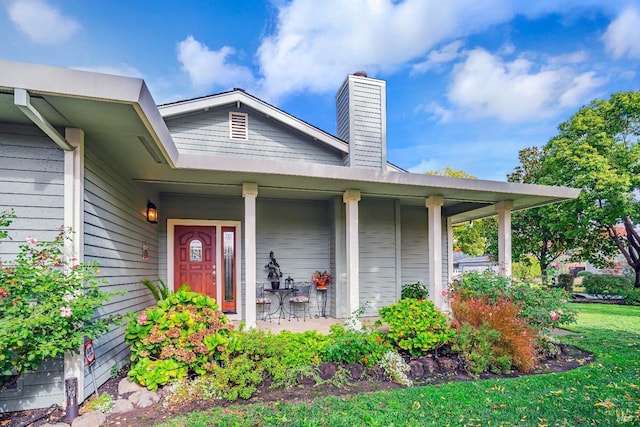 doorway to property featuring a porch