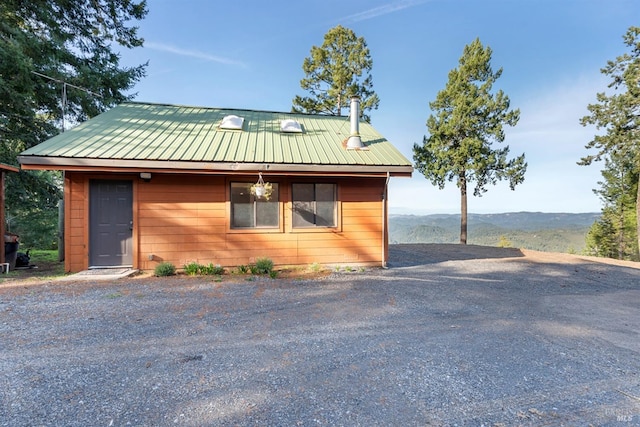 view of front of home with a mountain view