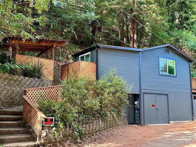 exterior space with a pergola