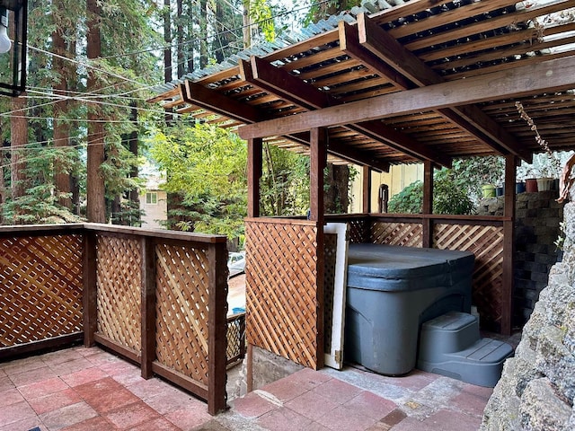 view of patio / terrace featuring a hot tub