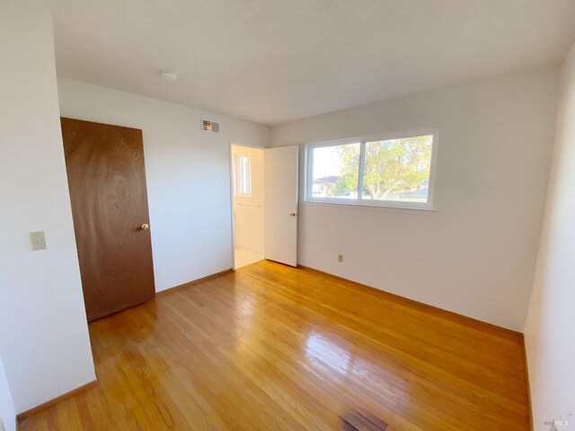 empty room featuring light hardwood / wood-style flooring