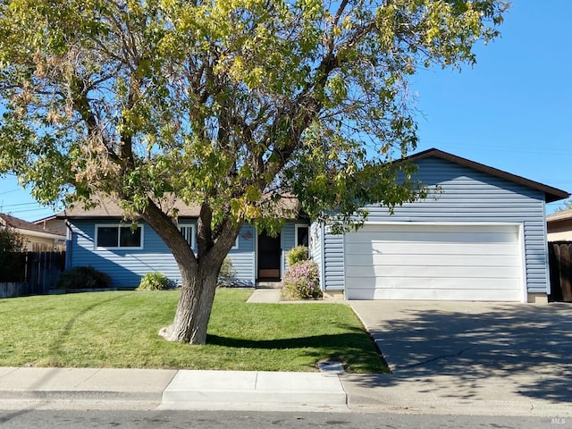 single story home featuring a garage and a front lawn