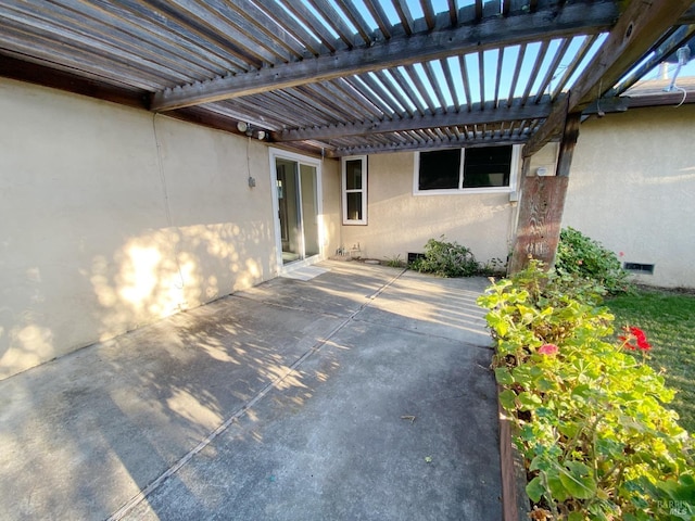 view of patio featuring a pergola