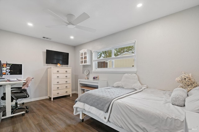 bedroom with dark wood-type flooring and ceiling fan