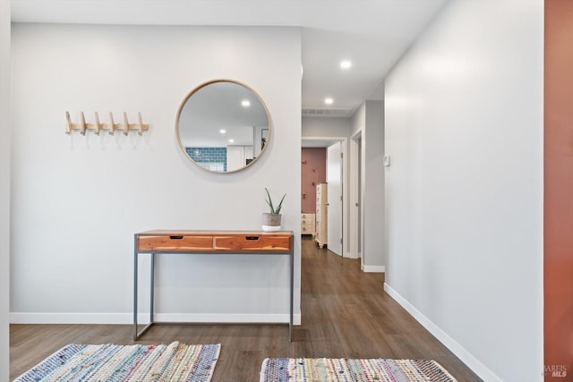 hallway featuring dark hardwood / wood-style floors