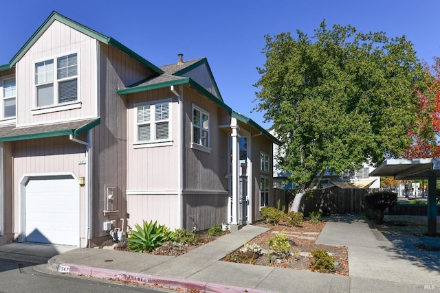 view of front of property with a garage