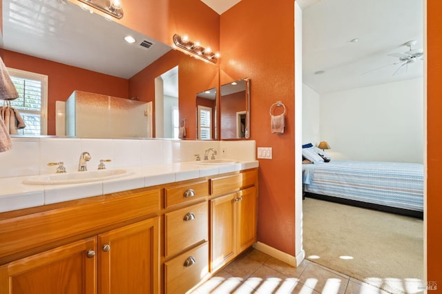 bathroom featuring vanity, ceiling fan, and tile patterned floors