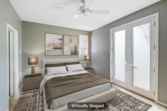 bedroom with french doors and ceiling fan