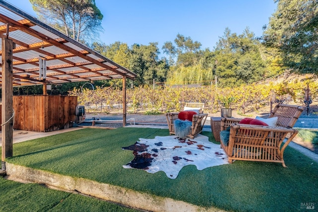 view of yard with a pergola and a patio area