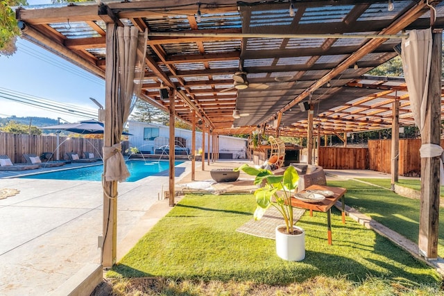 exterior space featuring a yard, a patio, and a pergola