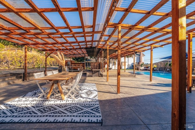 view of patio / terrace with pool water feature