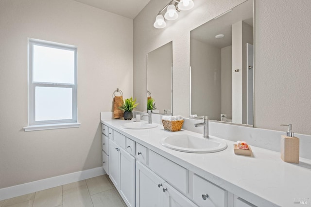 bathroom with vanity and tile patterned floors