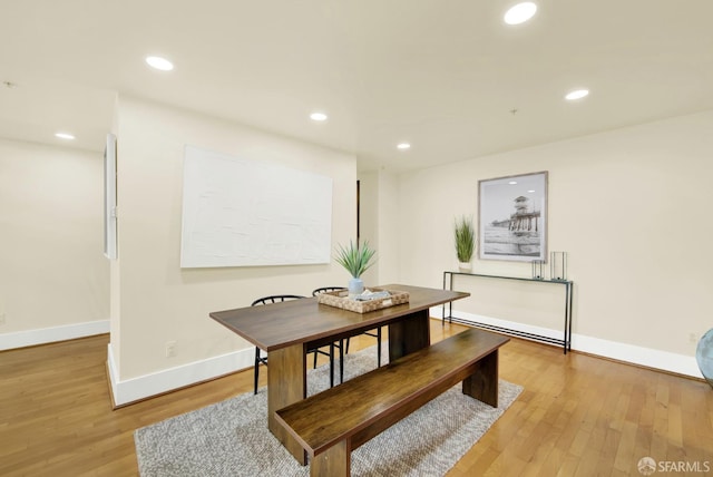 dining space with light wood-type flooring