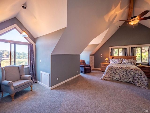 carpeted bedroom with vaulted ceiling and ceiling fan