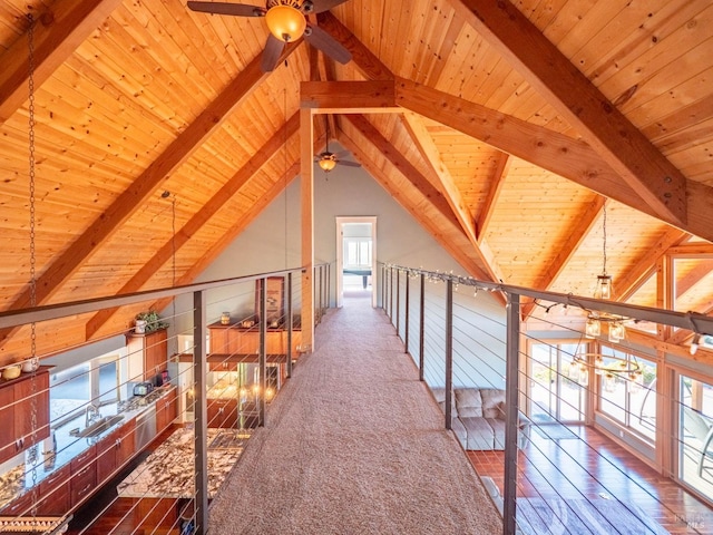 corridor featuring wood-type flooring, vaulted ceiling with beams, and wooden ceiling