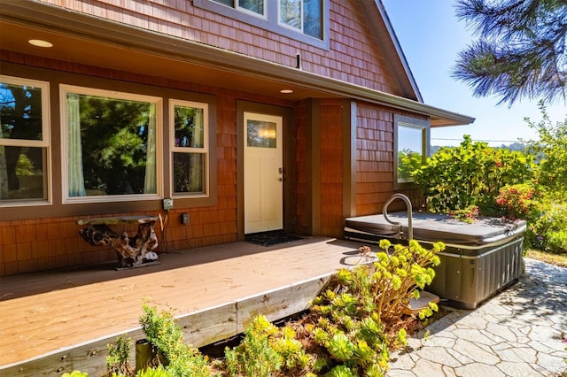 doorway to property with a deck