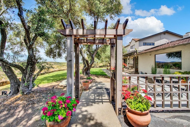 exterior space with a pergola