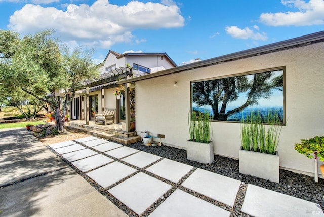 back of house with a patio area