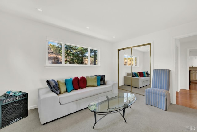 living room with light colored carpet