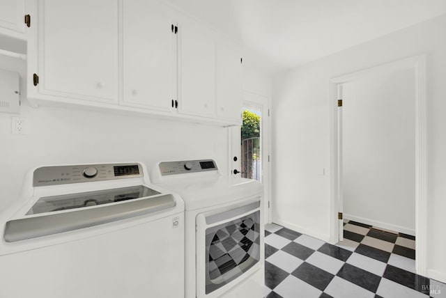 laundry room with cabinets and independent washer and dryer