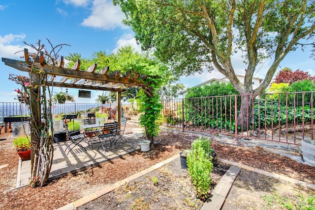 view of patio / terrace featuring a pergola