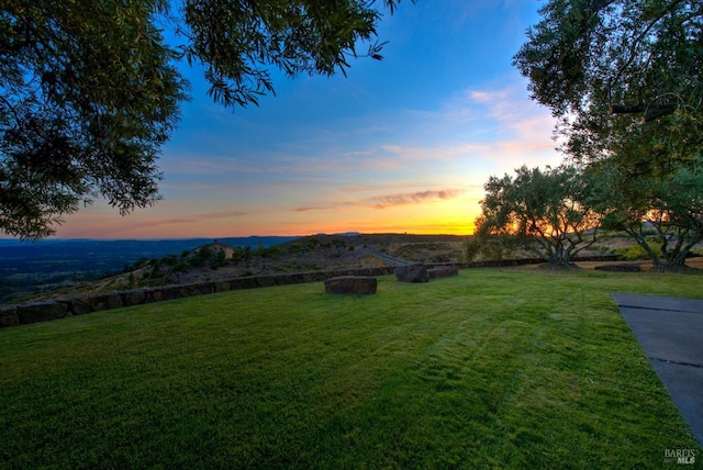 yard at dusk with a mountain view