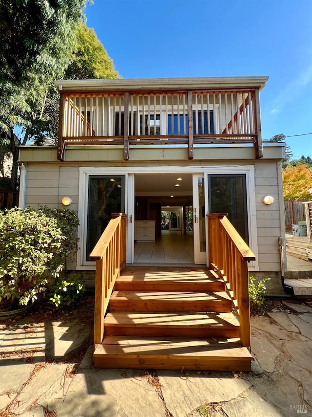 view of front of home with a balcony