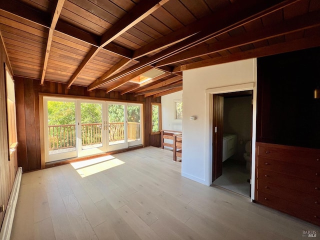 unfurnished sunroom with baseboard heating, vaulted ceiling with beams, and wood ceiling