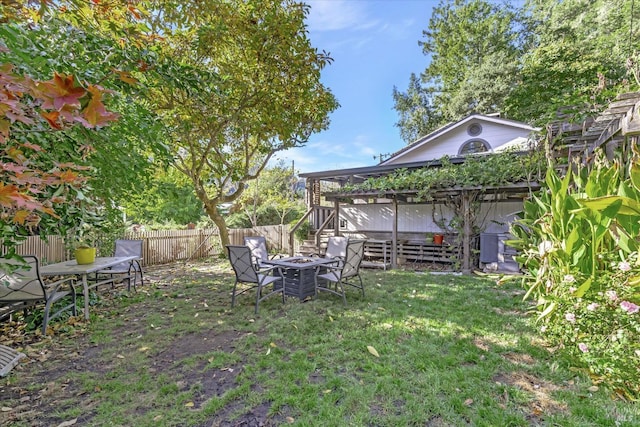 view of yard with a fire pit