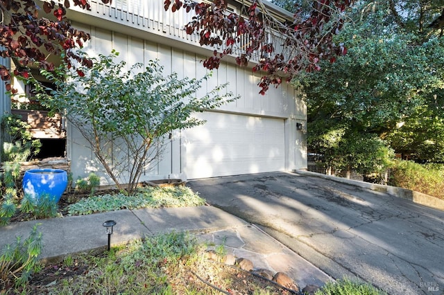 view of property exterior featuring a garage