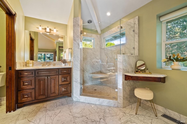 bathroom featuring vaulted ceiling with beams, a healthy amount of sunlight, and walk in shower