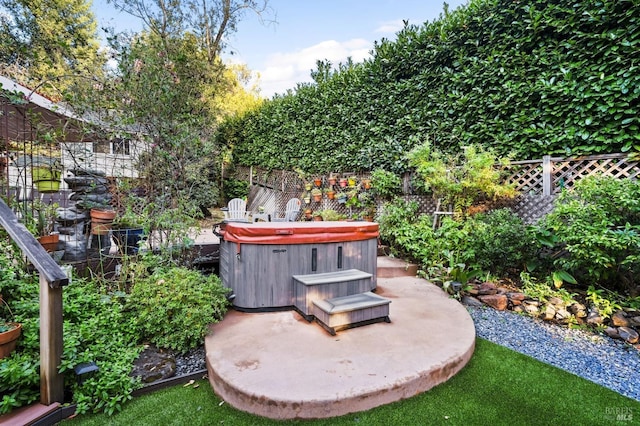 view of patio featuring a hot tub