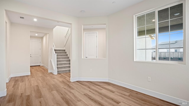 empty room with light wood-type flooring