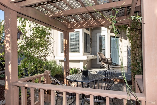 wooden terrace featuring a pergola