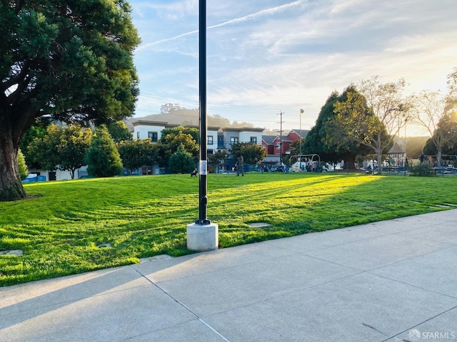 view of community featuring a yard