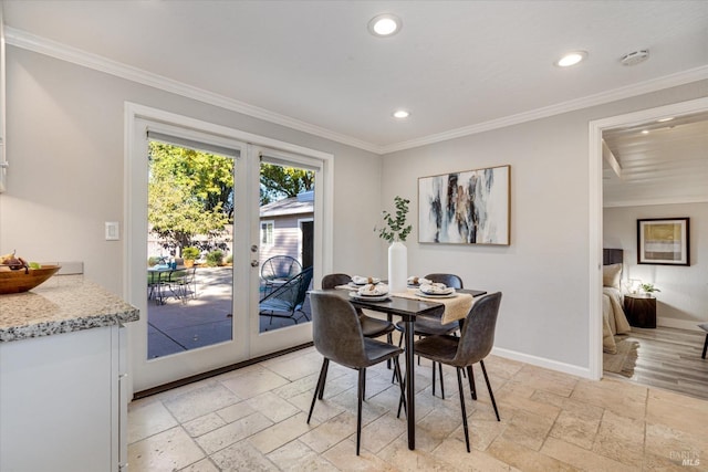 dining space featuring baseboards, ornamental molding, recessed lighting, and stone tile floors